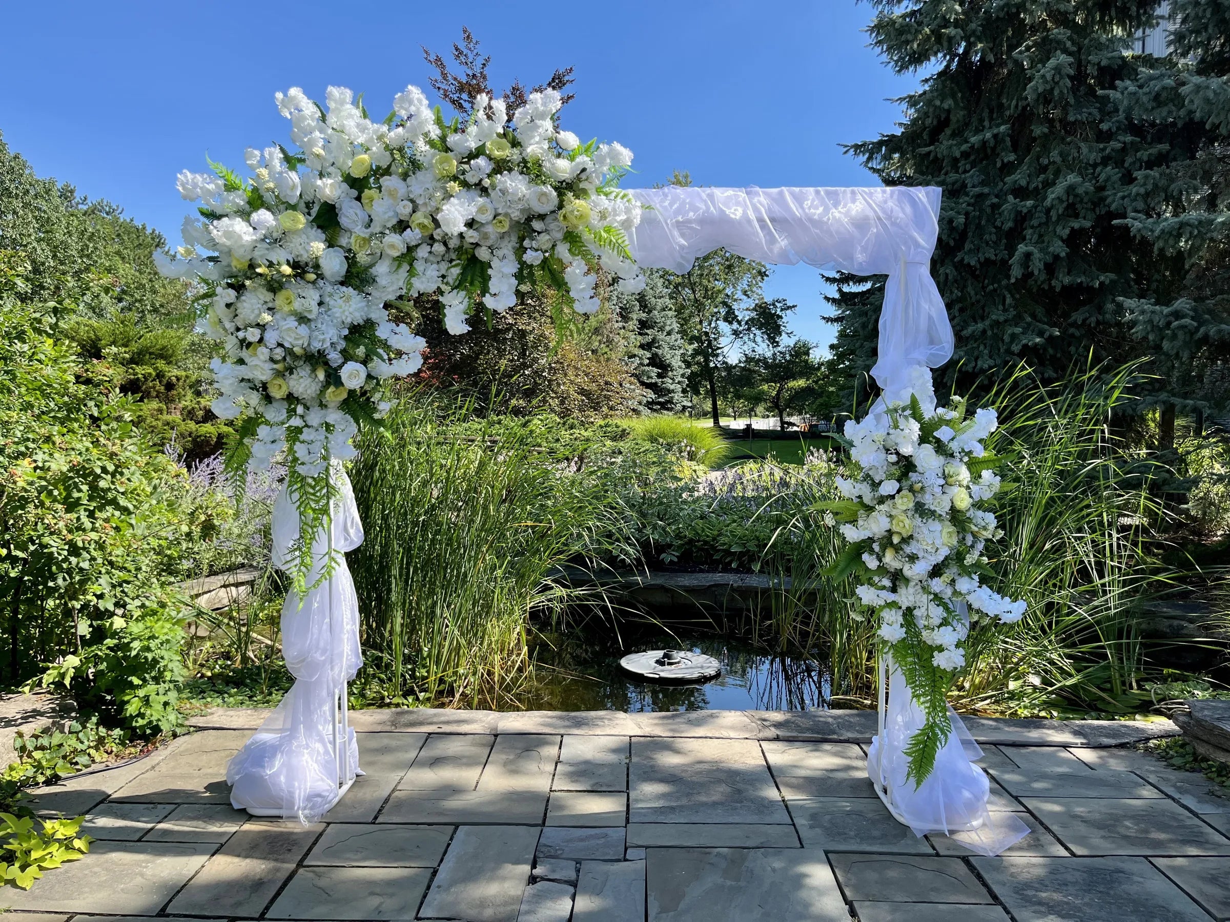 gray and beige gazebo near green leafed tree