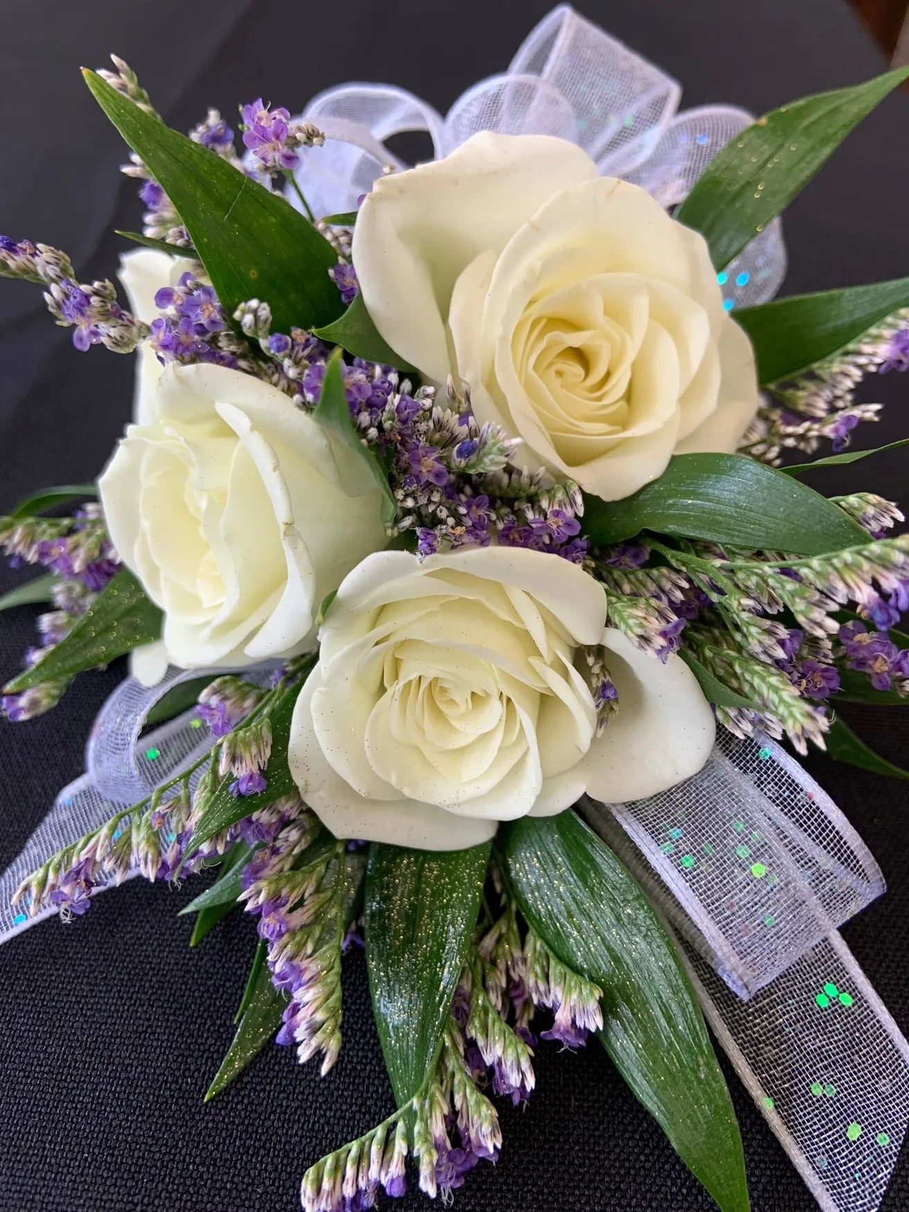 Flowers by Rey — corsage or boutonniere, photograph 093